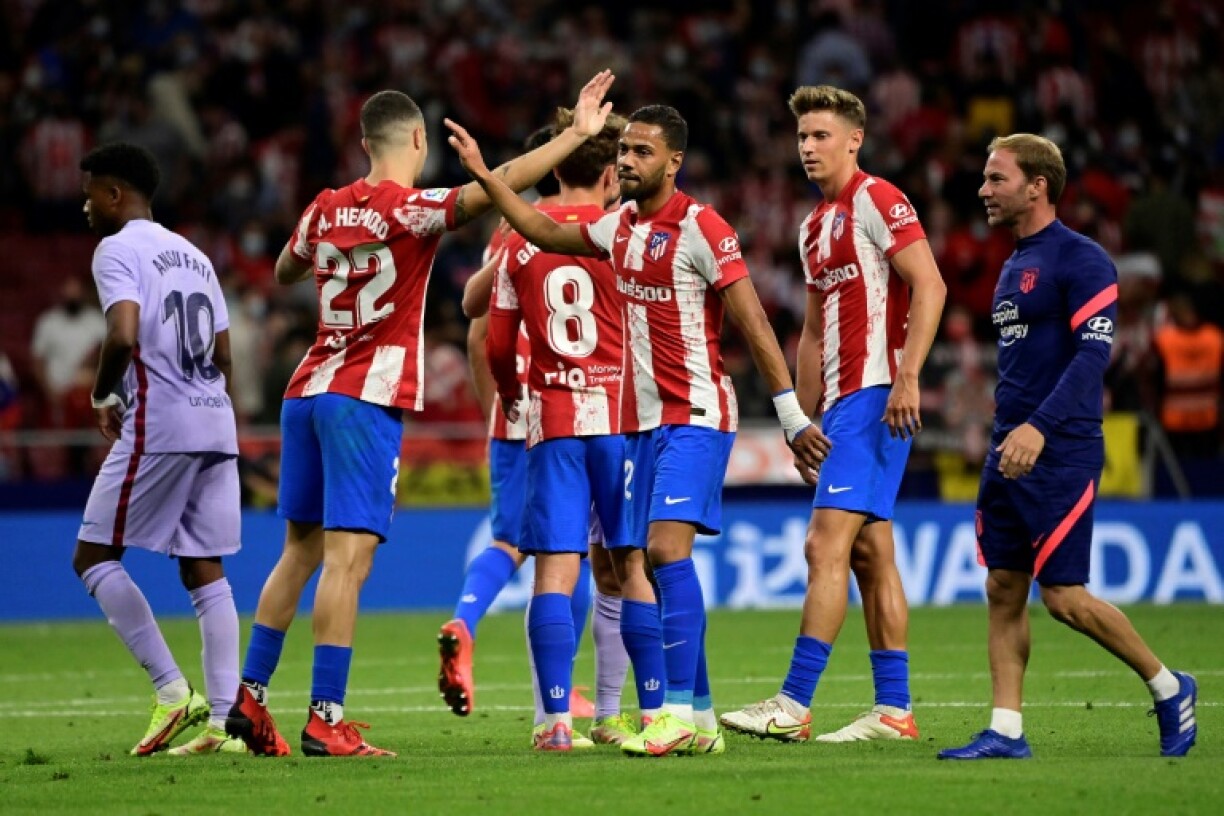 La joie des joueurs de l'Atlético Madrid, après leur victoire, 2-0 face à Barcelone, lors de la 8e journée de LaLiga, le 2 octobre 2021 au Wanda Metropolitano Stadium