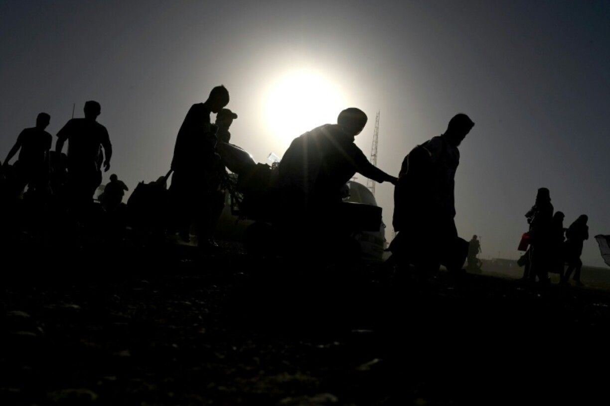 More than 230,000 Afghans left Iran in June, most of them deported, as returns surge ahead of a deadline set by Tehran, the United Nations migration agency said