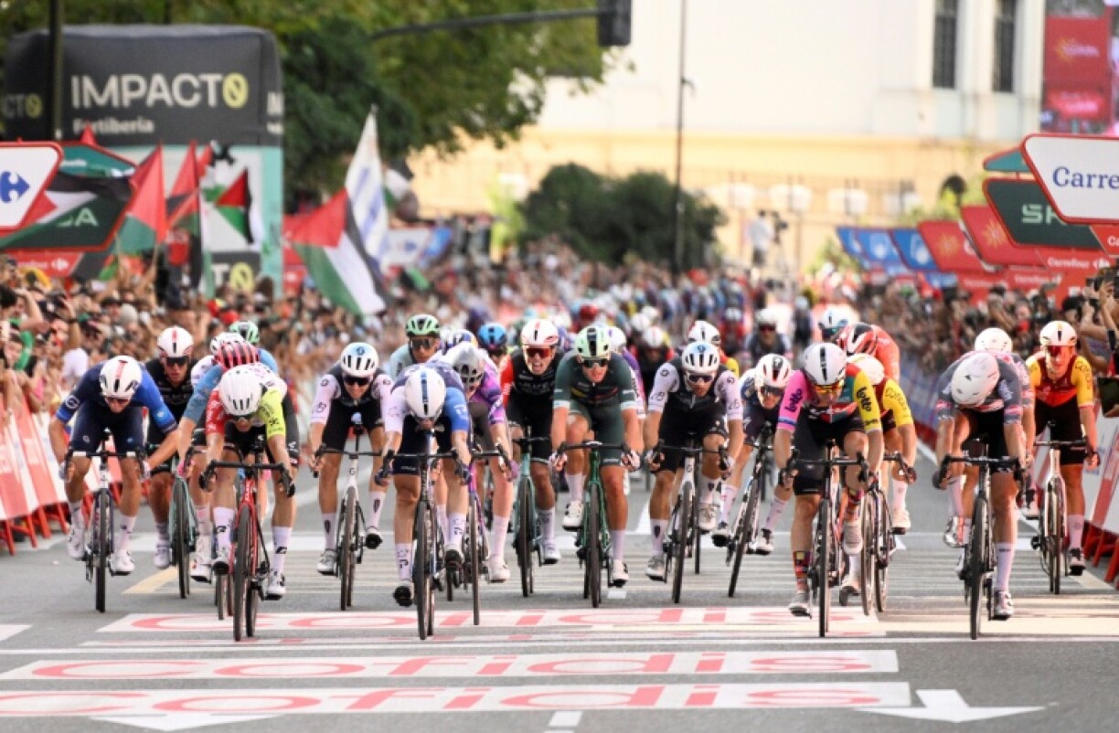 Team Alpecin's Belgian rider Jasper Philipsen (R) claimed stage eight victory at the Vuelta in Zaragoza