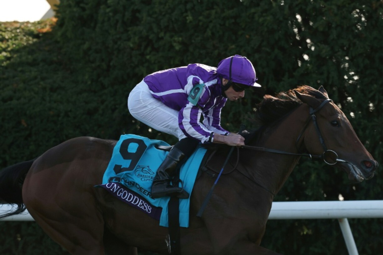 Sun Goddess, ridden by Ryan Moore, wins the Breeders' Cup Juvenile Fillies Turf at Keeneland