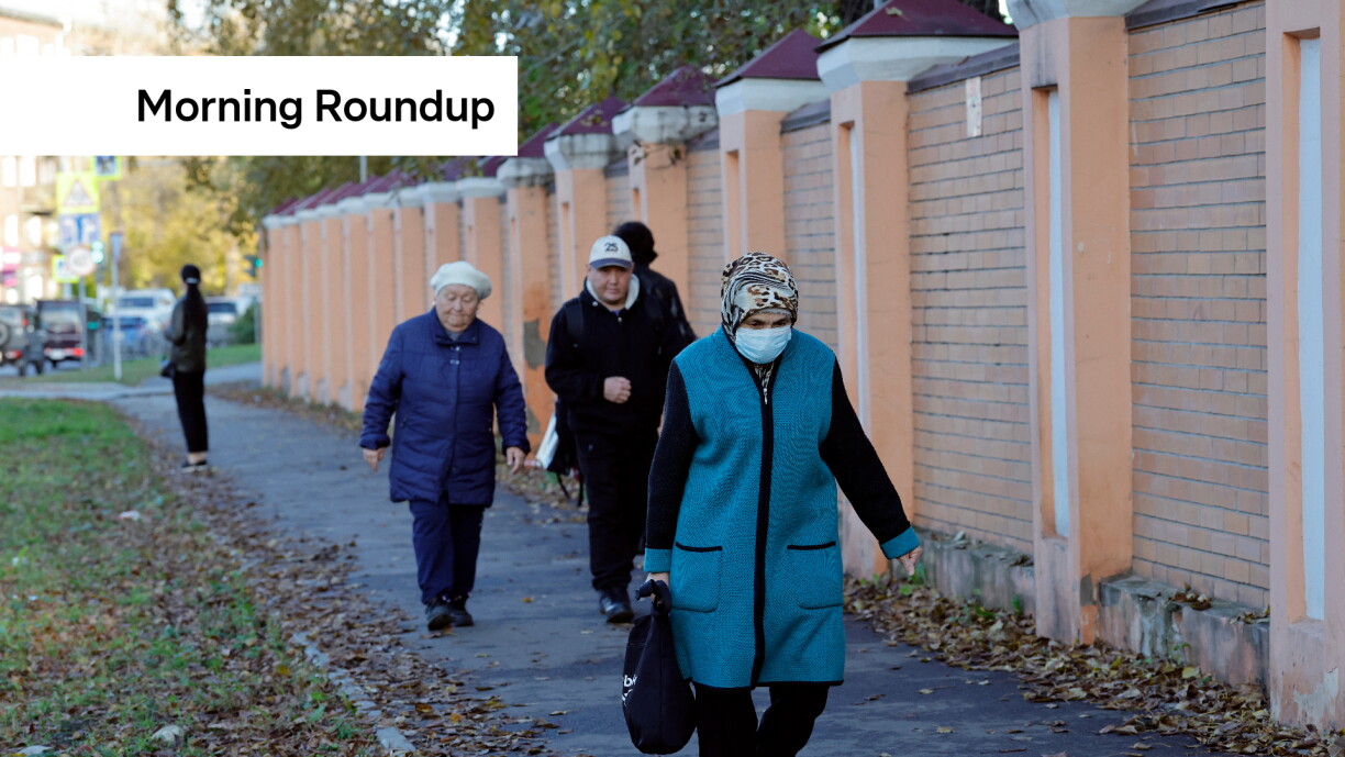 A woman wearing a face mask walks past the anti-plague institute in the city of Irkutsk on 7 October 2026.
