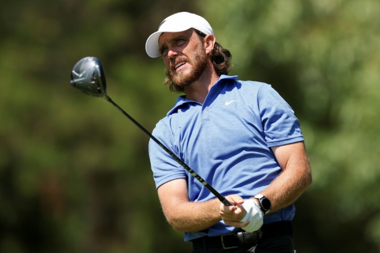 England's Tommy Fleetwood eyes a shot on the way to the second-round lead at the US PGA Tour St. Jude Championship in Memphis, Tennessee
