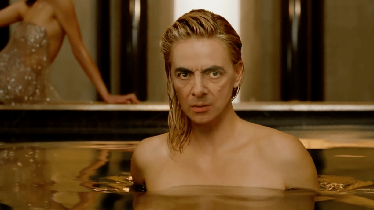 Beaarbecht Foto, wou dem Rowan Atkinson säi Gesiicht op dem Charlize Theron säi Kierper gesat gouf.