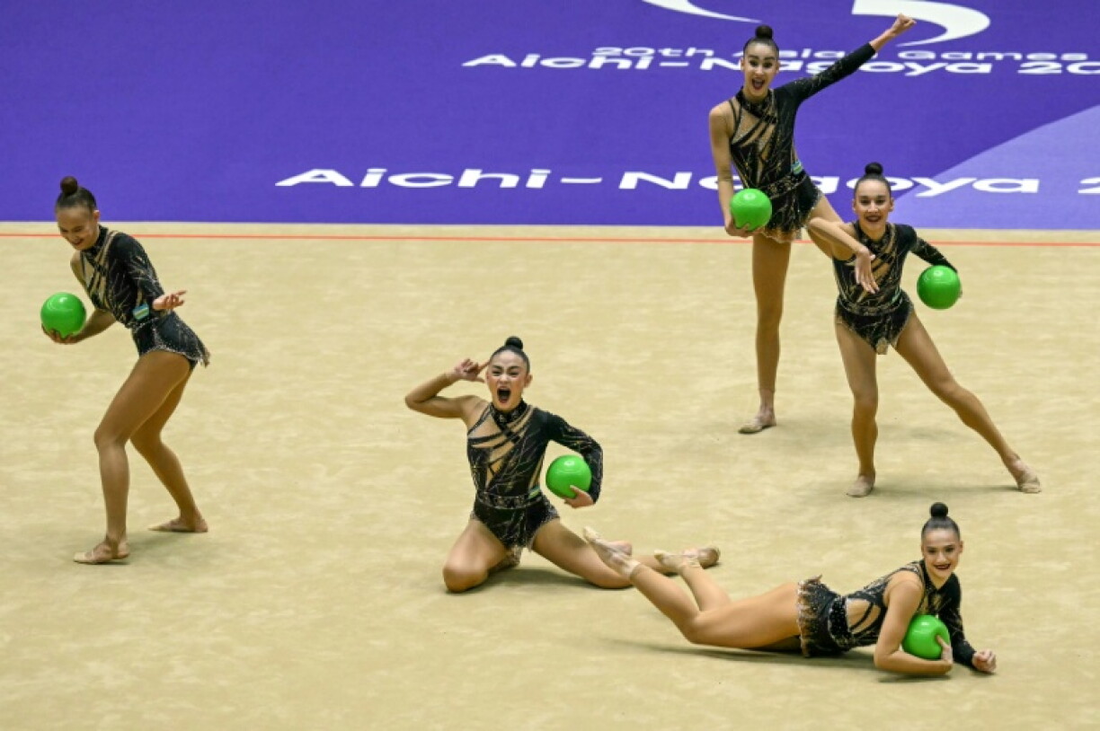 Uzbekistan's team competes in the group all-round rhythmic gymnastics final