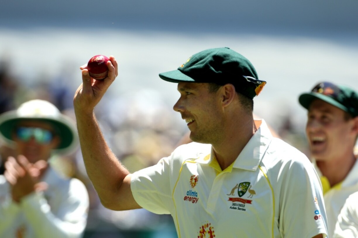 Scott Boland celebrates with the ball after his match-winning heroics in the Boxing Day Ashes Test in 2021