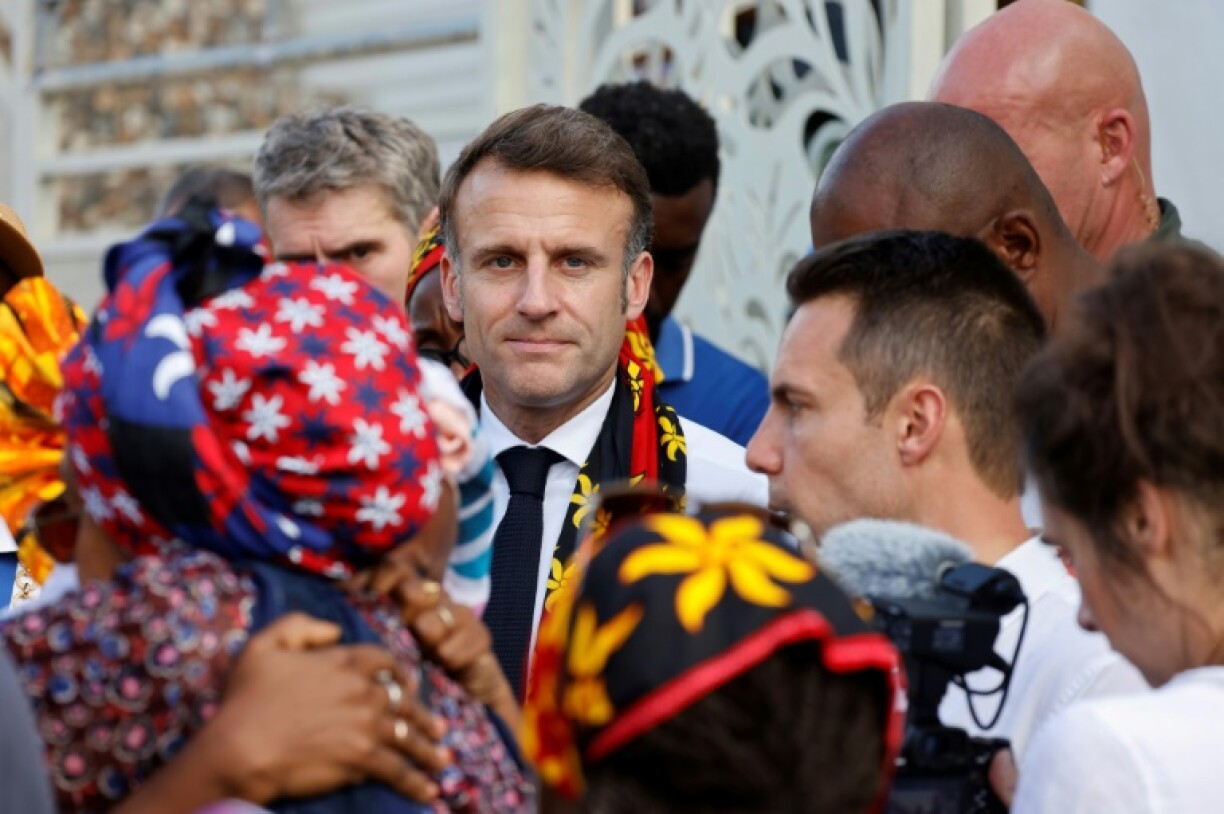 Angry locals confronted French President Emmanuel Macron over the response to Cyclone Chido