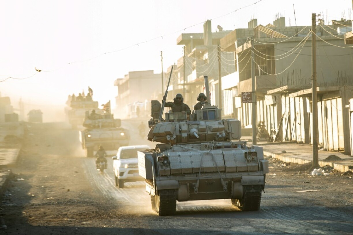 US forces patrol near Syria's northeastern border with Turkey on September 3, 2024