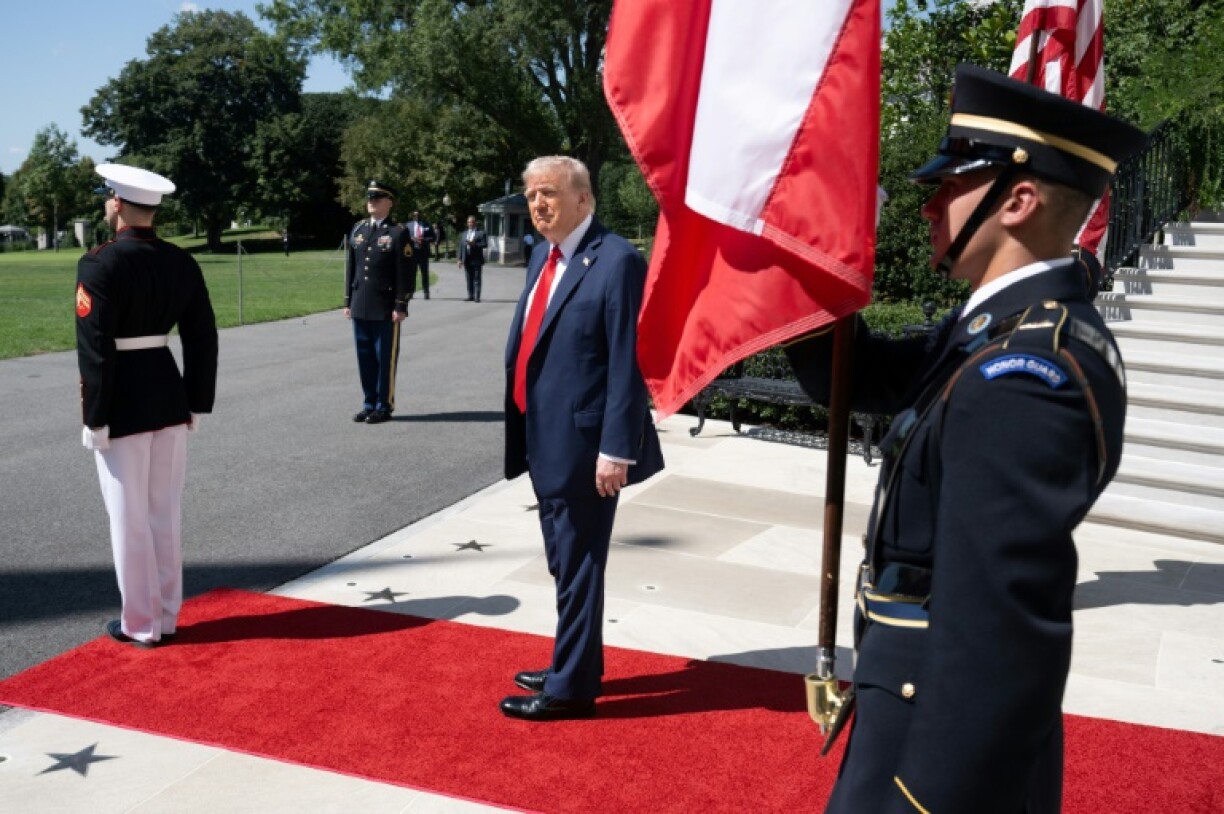 US President Donald Trump waits for Polish President Karol Nawrocki to arrive on the South Portico at the White House on September 3, 2025