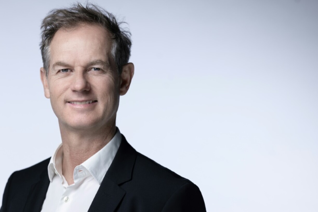 Former French freestyle skier Edgar Grospiron poses during a photo session in Paris on February 13