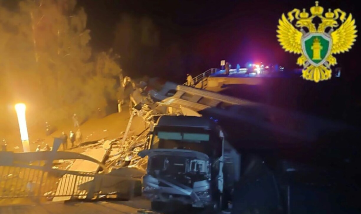 In Russia's Bryansk region bordering Ukraine, a road bridge collapsed onto a railway line late on Saturday, derailing a passenger train heading to Moscow and killing seven people