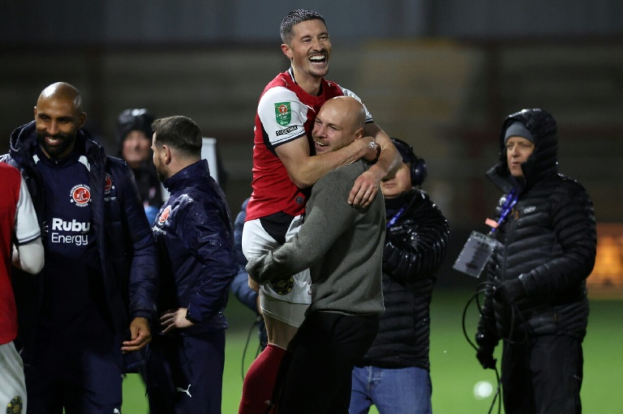 Fleetwood manager Matt Lawlor celebrates the League Cup victory over Arsenal