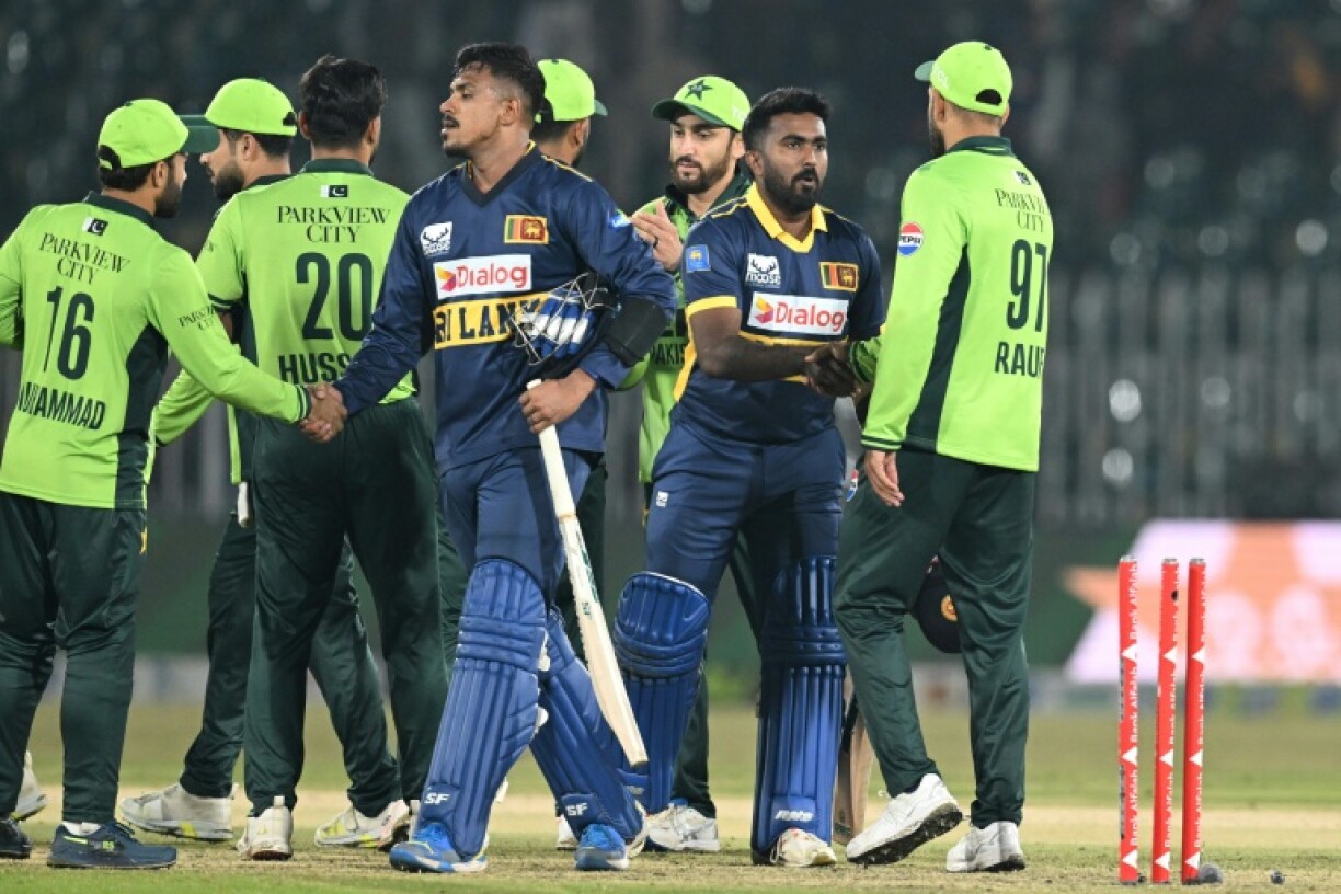 Sri Lanka's players shake hands with their Pakistan opponents after the first ODI in Rawalpindi on Tuesday