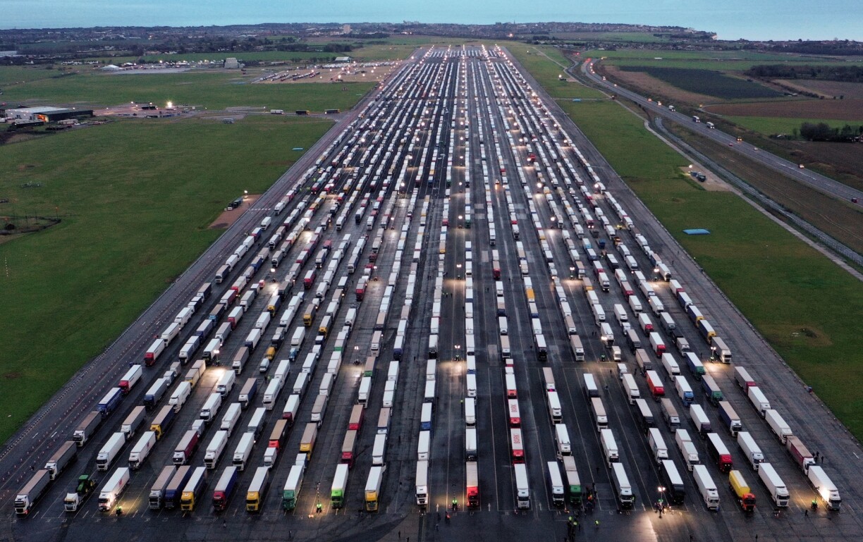 Lines of freight lorries and heavy goods vehicles parked on the tarmac at Manston Airport near Ramsgate, south east England on December 22, 2020, as the Brexit contingency plan