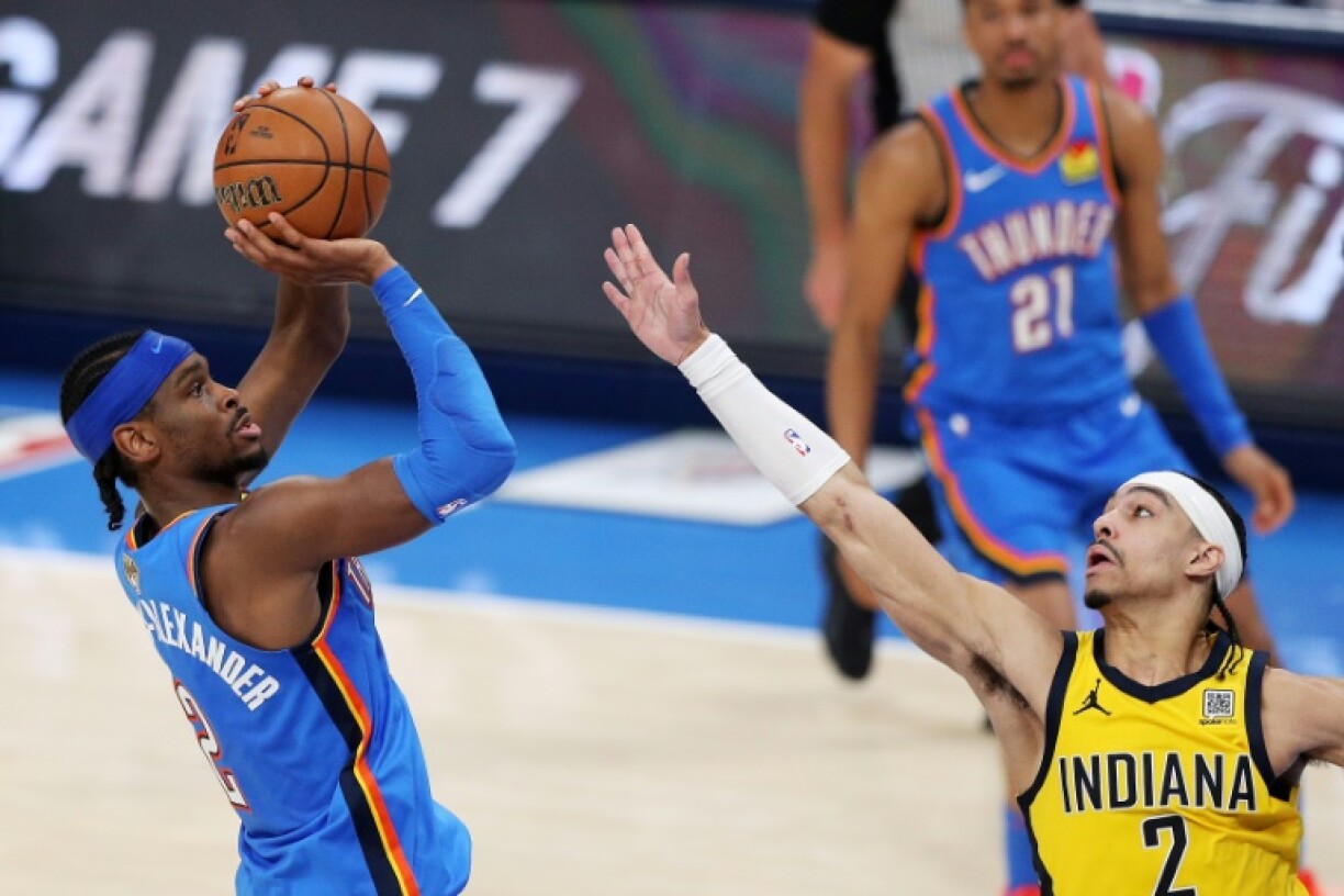 Shai Gilgeous-Alexander of the Oklahoma City Thunder puts up a shot against Andrew Nembhard in the Thunder's title-clinching victory over the Indiana Pacers in game seven of the NBA Finals