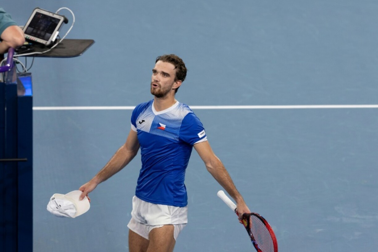 Tomas Machac speaks to the umpire during his singles semi-final against Taylor Fritz