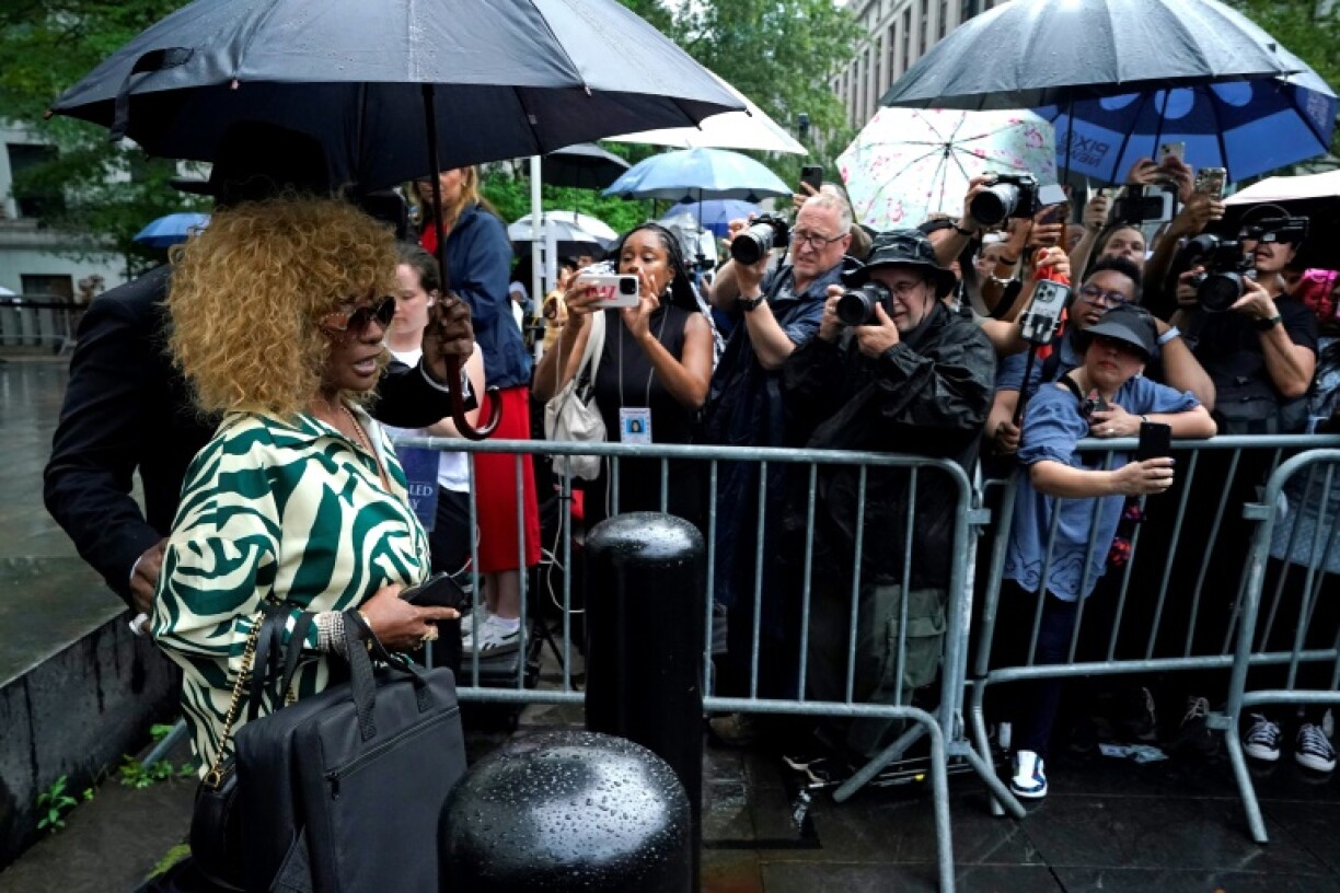 Janice Combs, mother of Sean 'Diddy' Combs, (L) departs federal court as jury continues deliberations in the music mogul's criminal trial