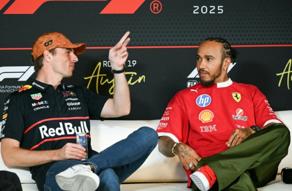 The last time a heat hazard was declared at a Formula One Grand Prix, four-time world champion Max Verstappen (L) said he did not intend to wear a cooling vest