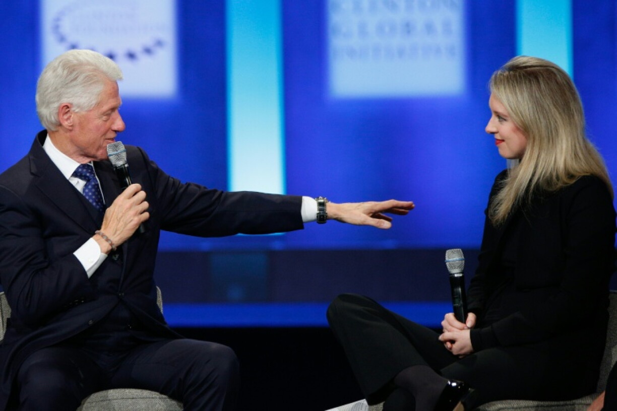 Disgraced Theranos founder Elizabeth Holmes, who spoke to former president Bill Clinton at an event in 2015, is the subject of a new documentary in theaters October 16