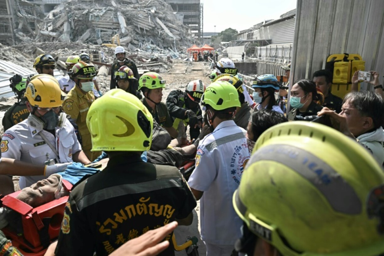 Dozens of people were trapped after a building under construction collapsed following a powerful earthquake in Bangkok