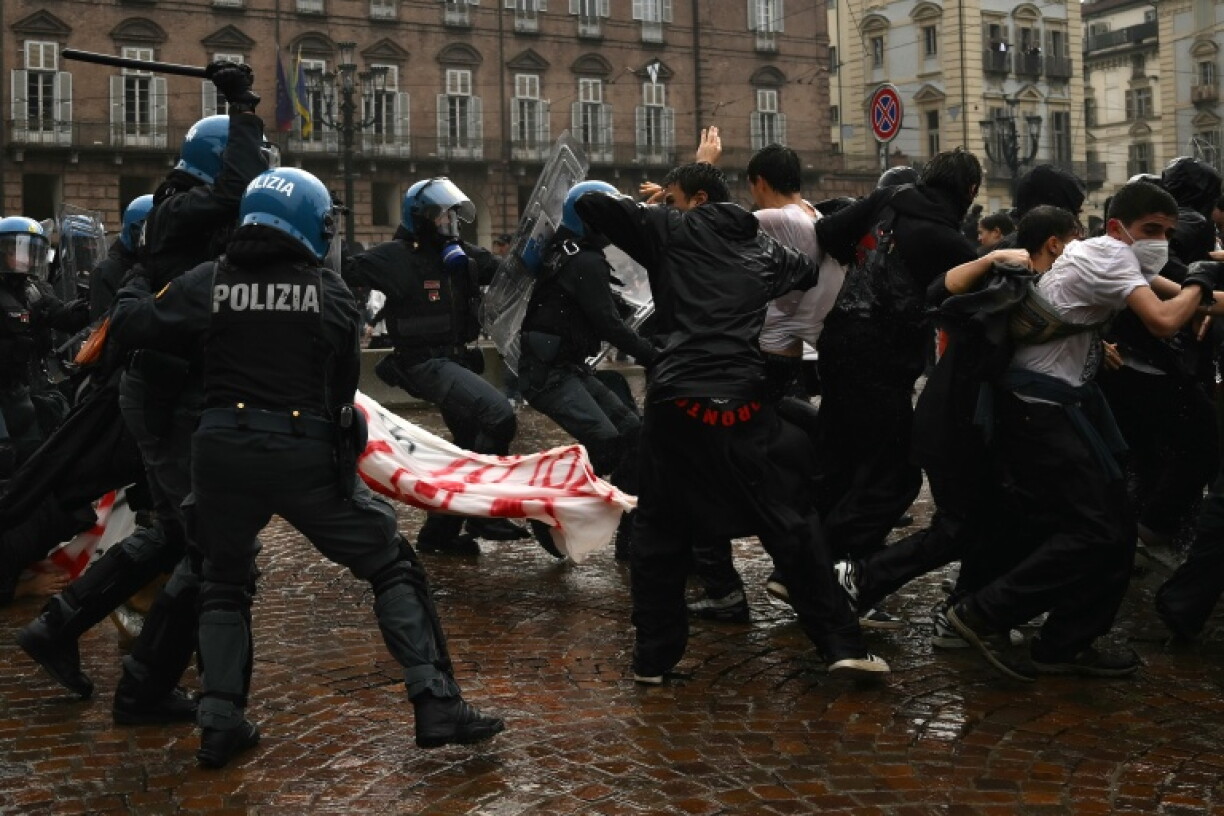 Police clashed with protesters in Turin on a national day of marches
