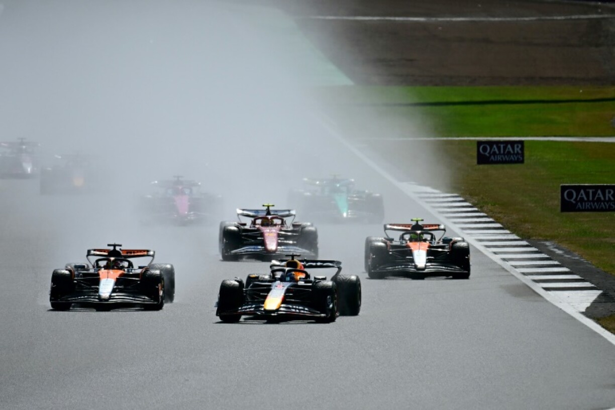 Pole-sitter Max Verstappen leads the pack at Silverstone before finishinmg fifth