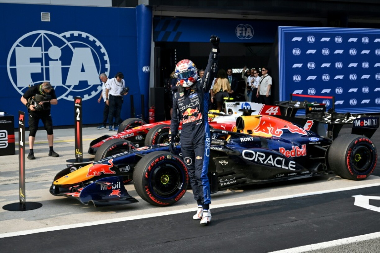 Max Verstappen salutes the crowd after qualifying in pole position for the Bahrain Grand Prix being raced in Malaysia