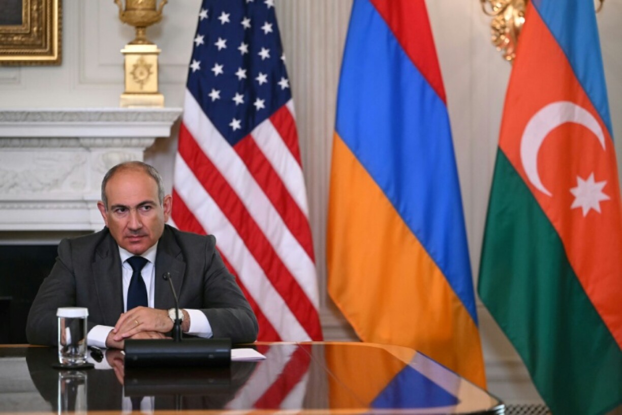 Armenian Prime Minister Nikol Pashinyan looks on during a trilateral signing with US President Donald Trump and Azerbaijani President Ilham Aliyev in the State Dining Room of the White House in Washington, DC on August 8, 2025