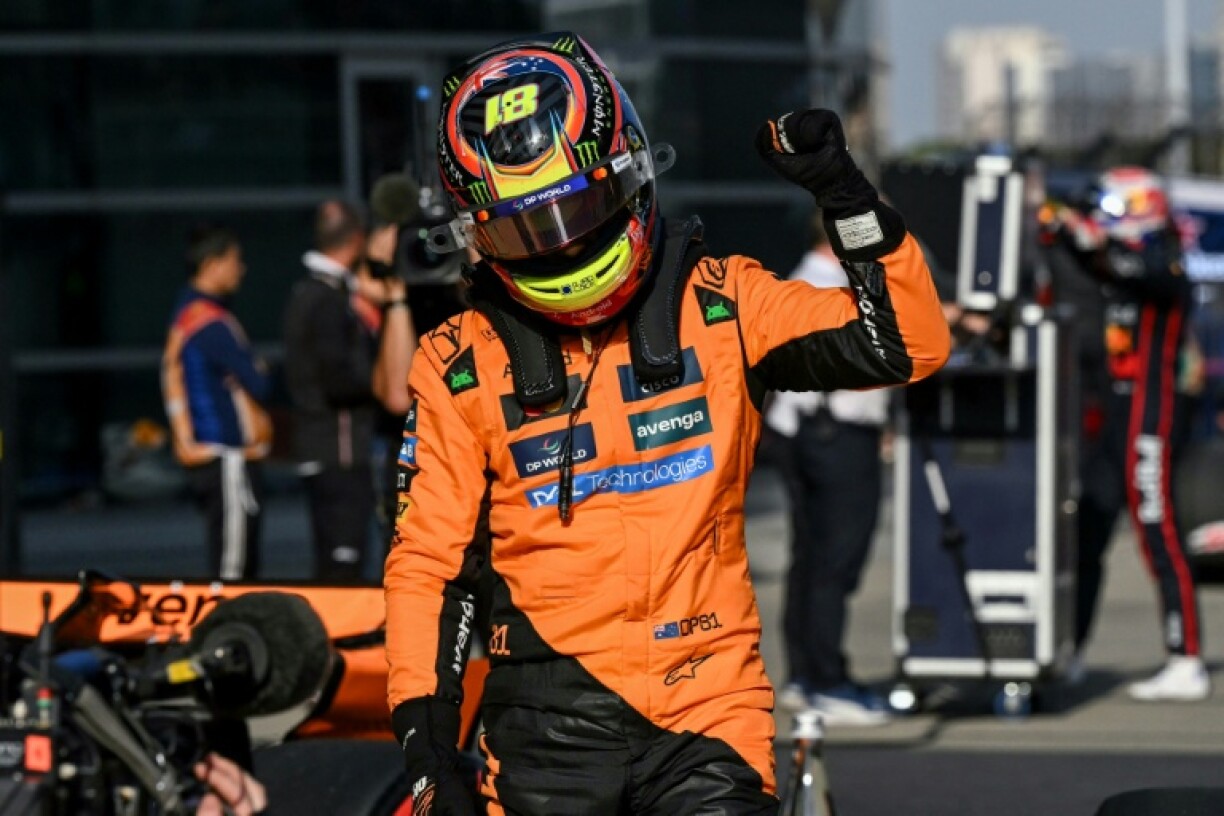 Oscar Piastri celebrates taking pole position