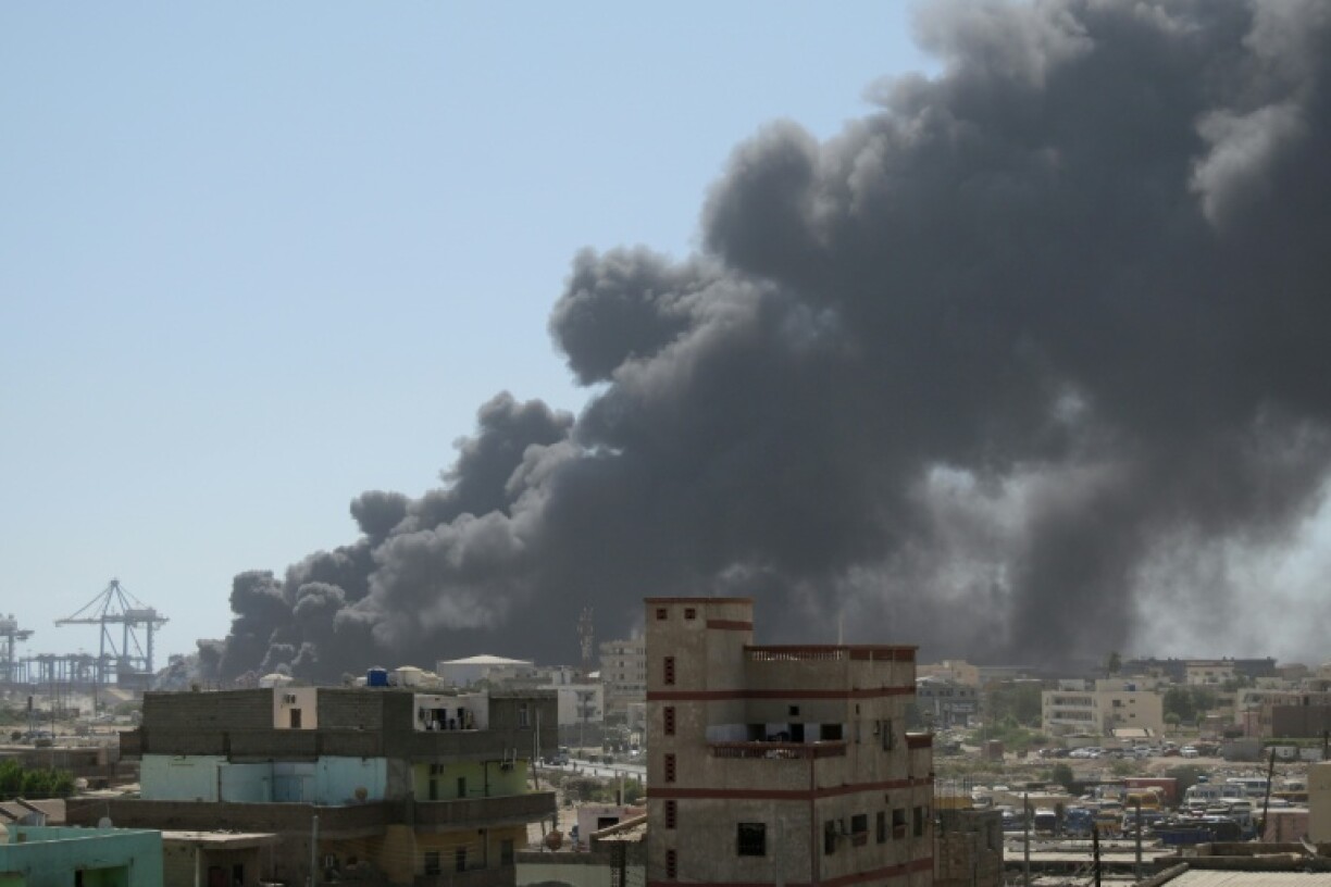 Smoke billows over Port Sudan after a paramilitary drone strike on the army-contolled aid hub on Tuesday.