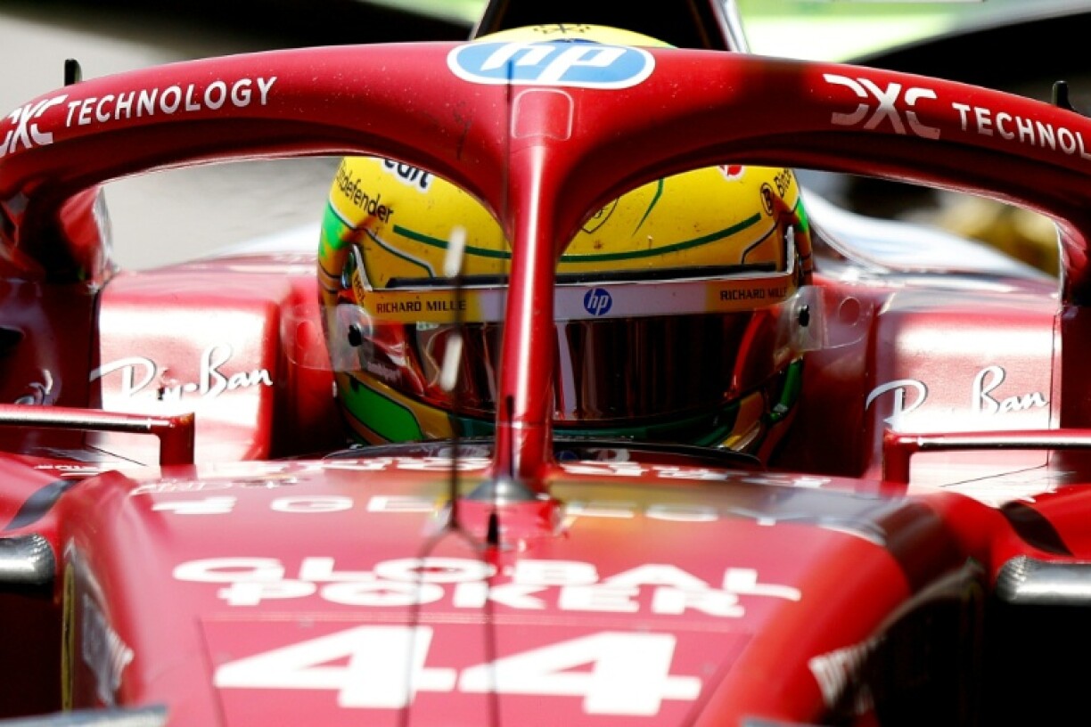 Lewis Hamilton stops in the pits in Sao Paulo during another say of Ferrari struggles