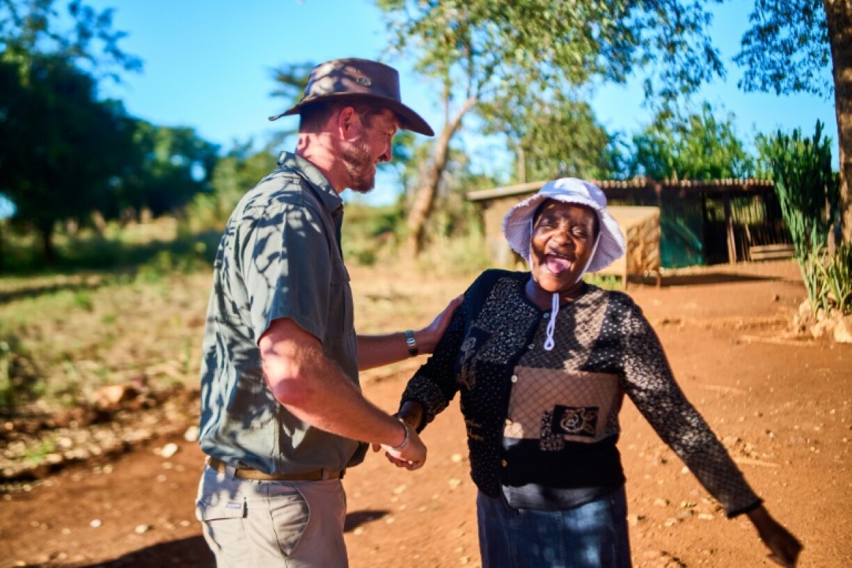 Daniel Burger and Miriam Mupambawashe work together to build their farming land