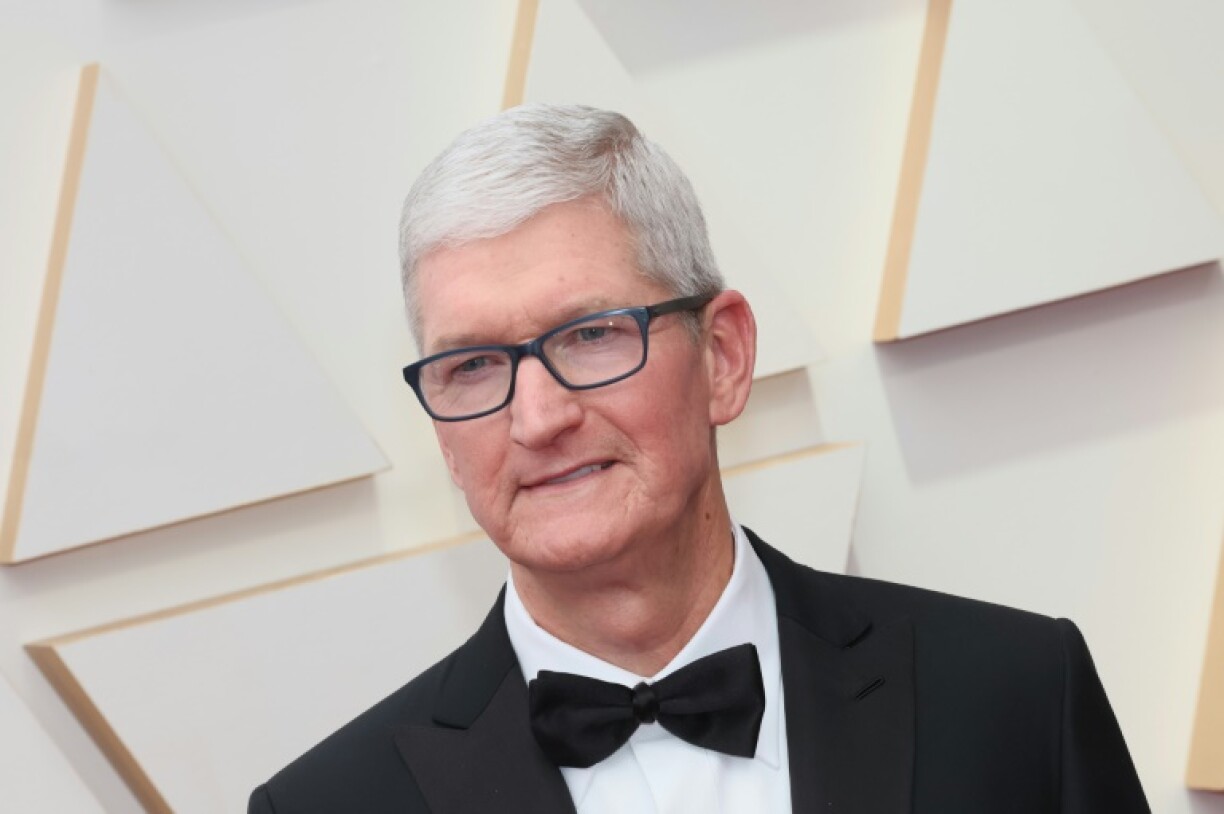 Apple chief executive, pictured here at the 94th Annual Academy Awards, says its artificial intelligence technology is 'elevating' experiences in its lineup of devices