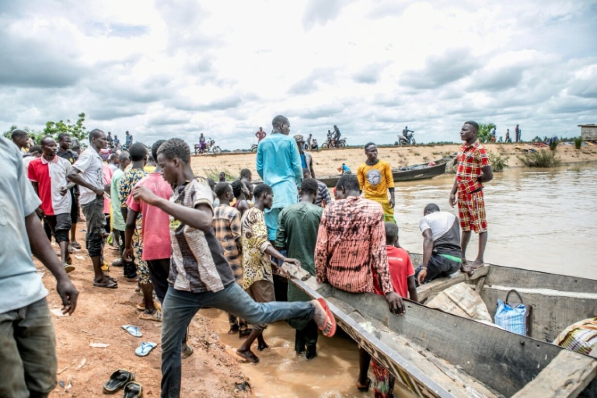 The Niger river crossing is still busy but trucks have to take a dangerous detour