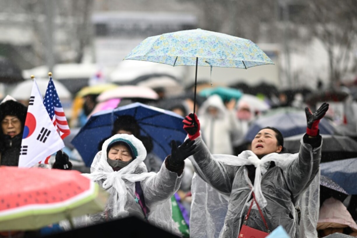 Supporters of impeached President Yoon Suk Yeol gathered near his residence, despite bitter snow conditions blanketing the capital