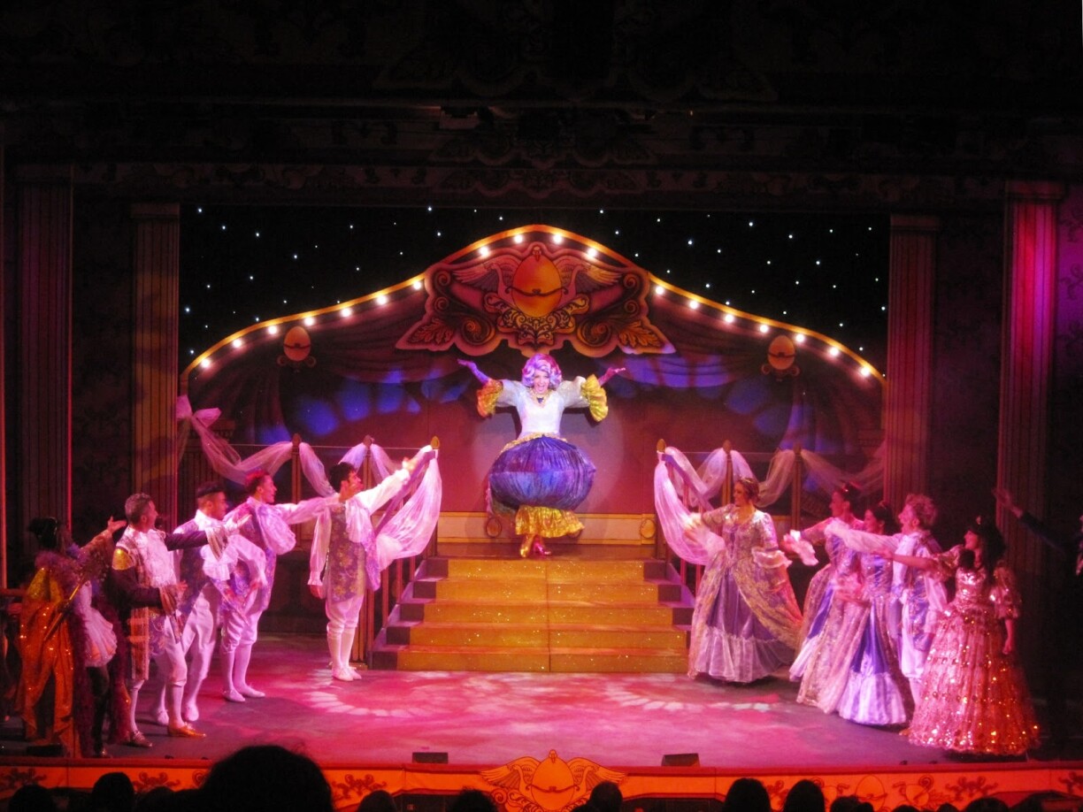 A man dressed in drag (centre) is the star of the Christmas panto.
