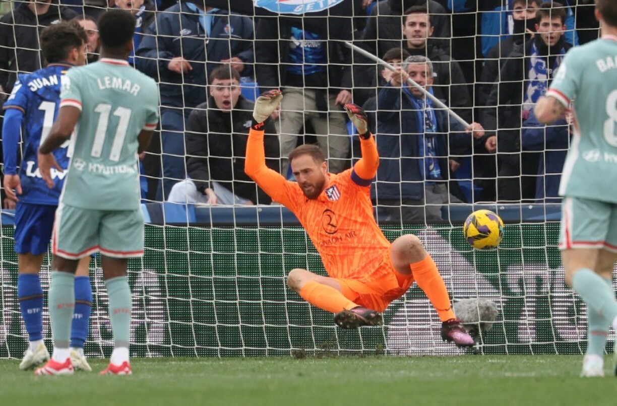 Atletico goalkeeper Jan Oblak reacts after being beaten by Getafe's second goal in their comeback victory on Sunday
