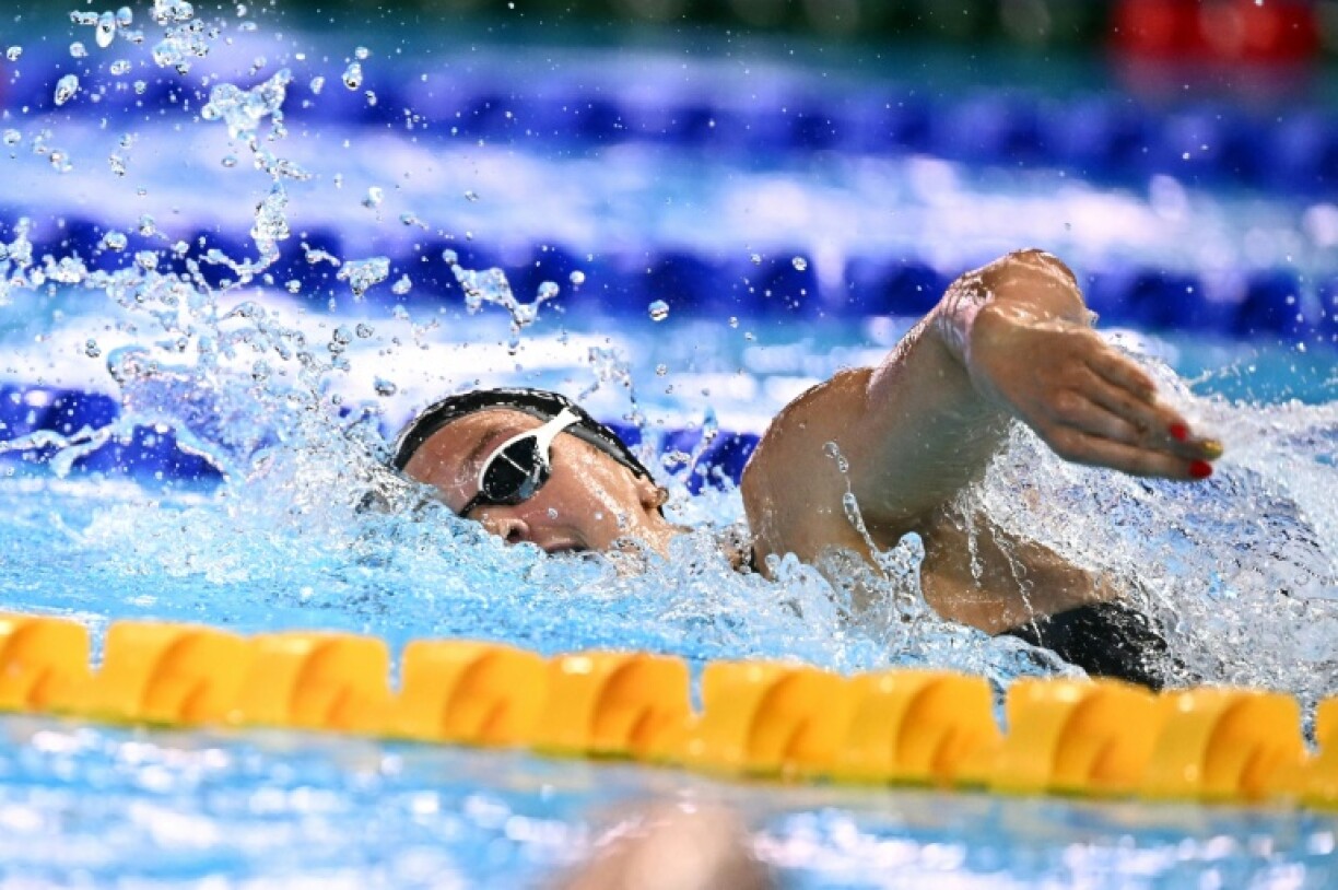 Summer McIntosh (pictured) romped home in 3min 56.26sec, nearly two seconds clear of China's Li Bingjie, who was followed by American Katie Ledecky in a disappointing bronze