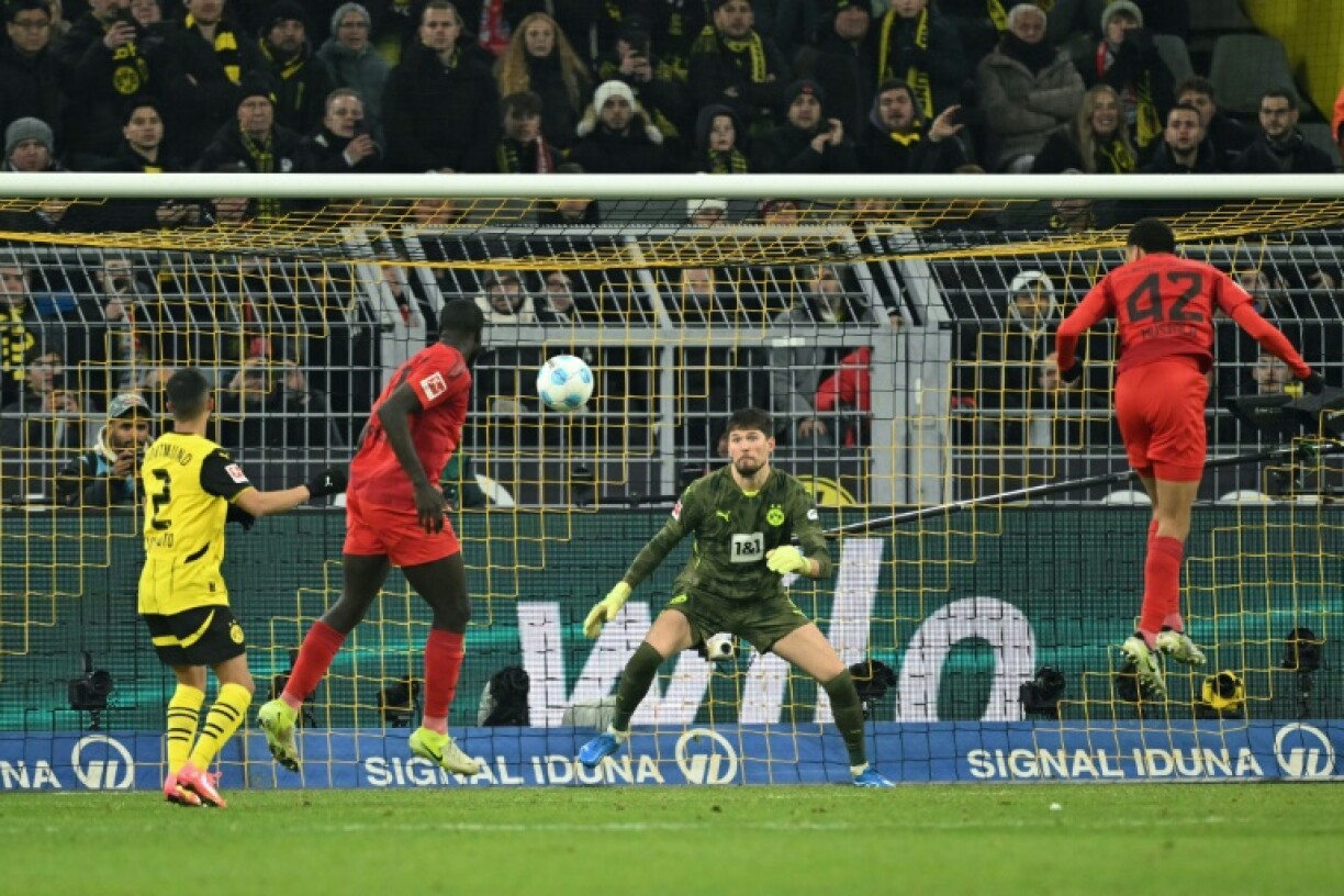 Jamal Musiala (R) equalised for Bayern Munich in their 1-1 draw at Borussia Dortmund