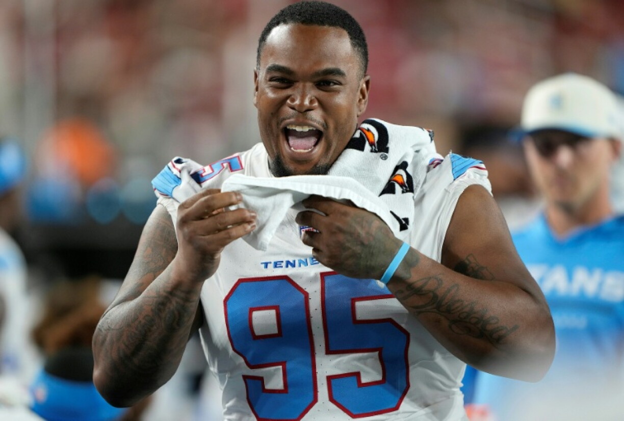 Former Tennessee Titans defensive tackle Jordan Elliott was released after pulling a gun in the NFL team's headquarters' parking lot but received support from Titans coach Robert Saleh