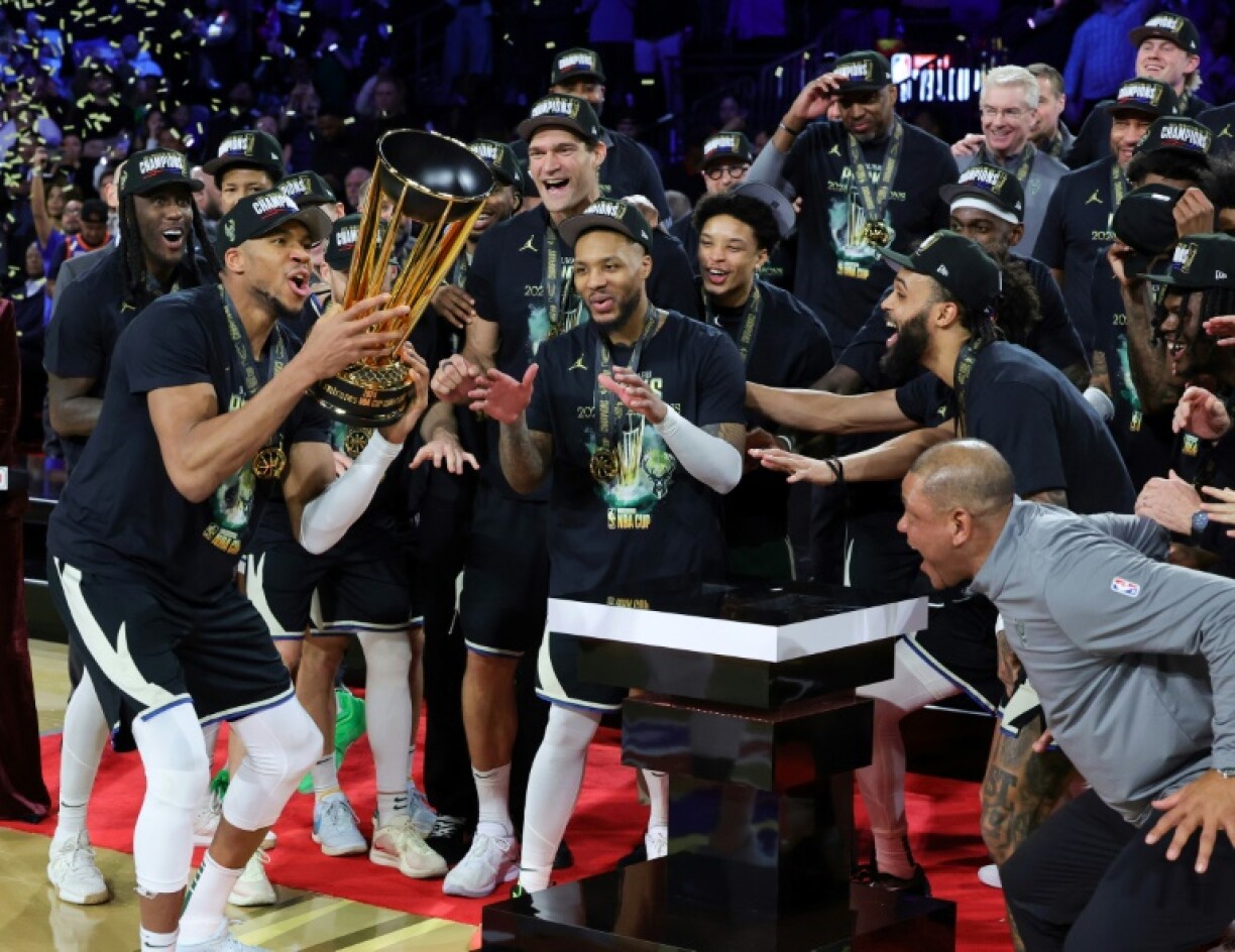 Giannis Antetokounmpo and his Milwaukee Bucks teammates celebrate their 2024 NBA Cup triumph