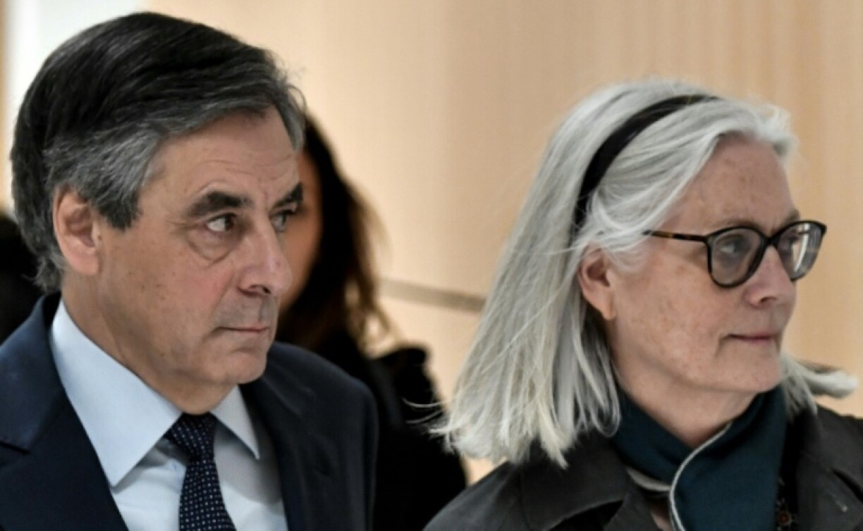L'ancien Premier ministre François Fillon et son épouse Penelope Fillon au palais de justice de Paris.
