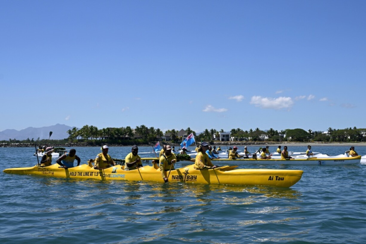 Climate advocates and Greenpeace campaigners sail towards the venue of the Pacific Pre-COP31 Summit in Nadi on October 7, 2026