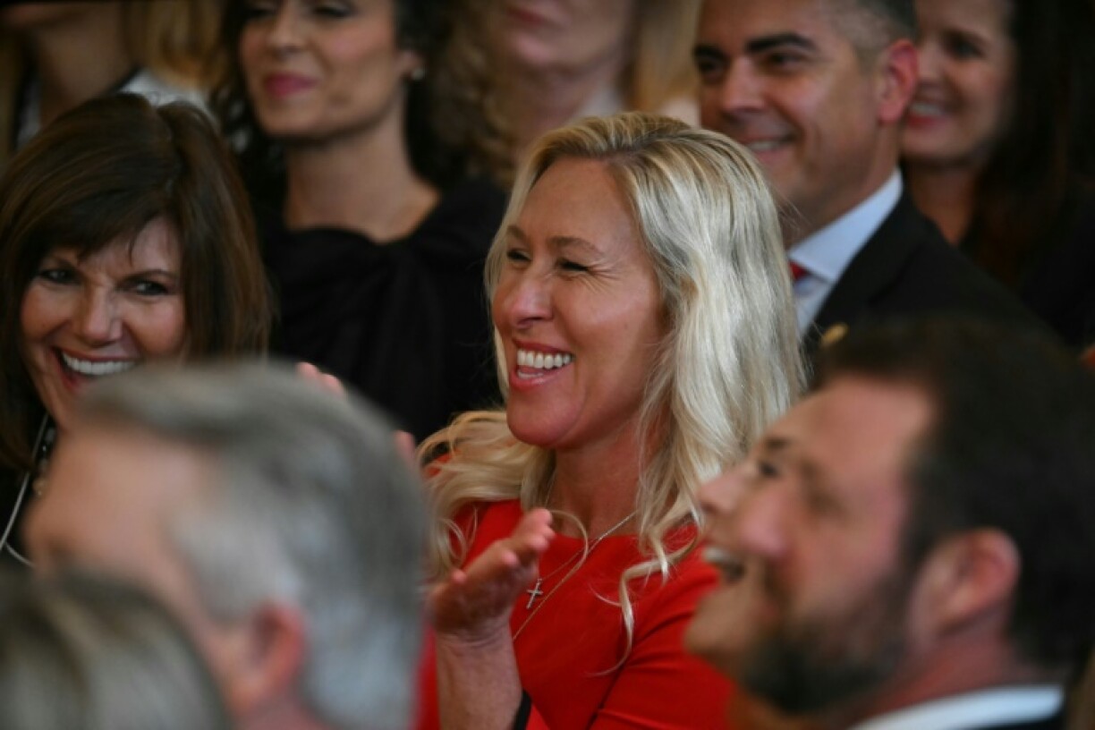 US Rep. Marjorie Taylor Greene (R-GA) waits for US President Donald Trump to sign the No Men in Women's Sports Executive Order into law in the East Room of the White House in Washington, DC