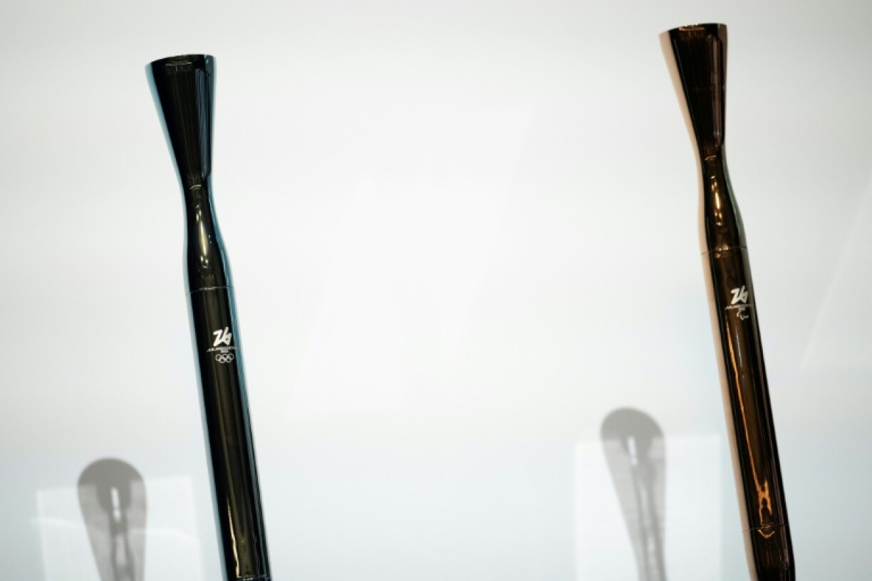 The torches for the Milano Cortina 2026 Winter Olympics (L) and Paralympics (R) have been unveiled