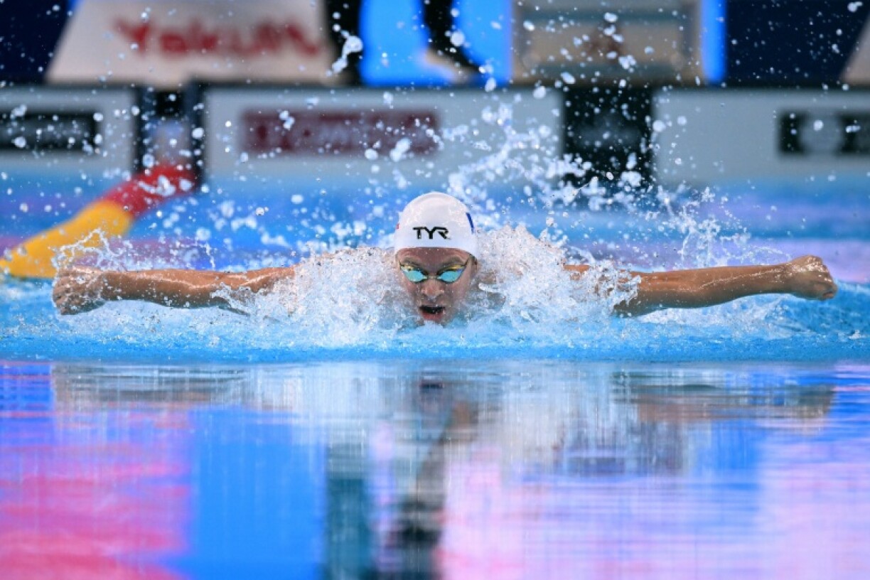 France's Leon Marchand won the 200m medley world title in Singapore on Thursday