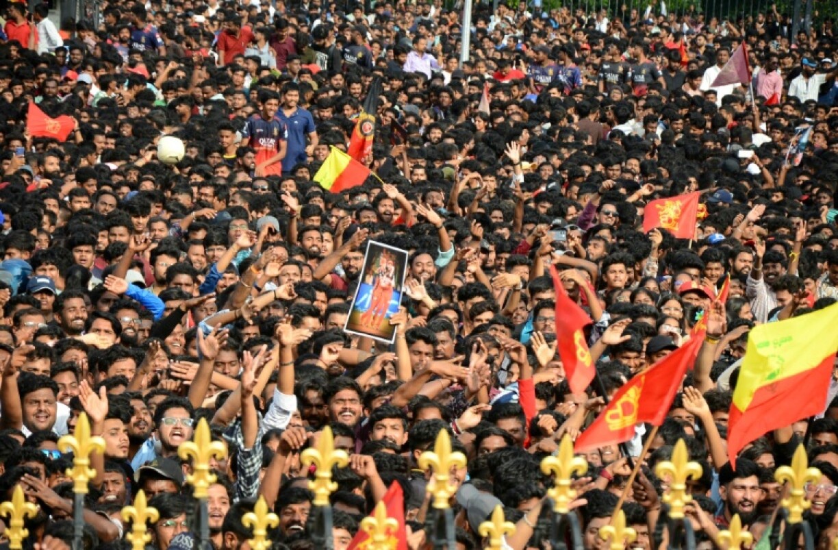 Thousands gather outside the Vidhana Soudha to celebrate the Royal Challengers Bengaluru winning the Indian Premier League (IPL), in Bengaluru on June 4, 2025