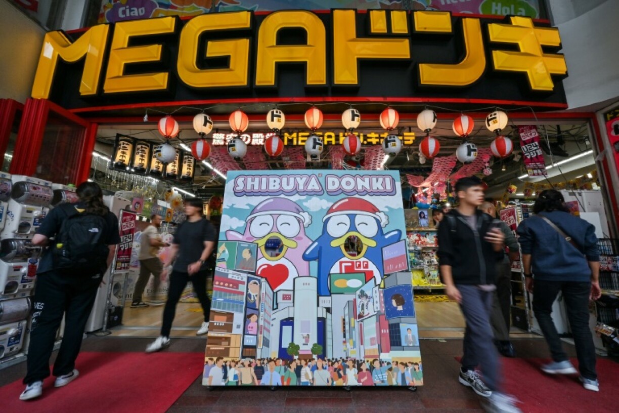 Business is booming at Japanese discount chain Don Quijote, which sells everything from compact gadgets to party costumes, thanks to its cult status among tourists