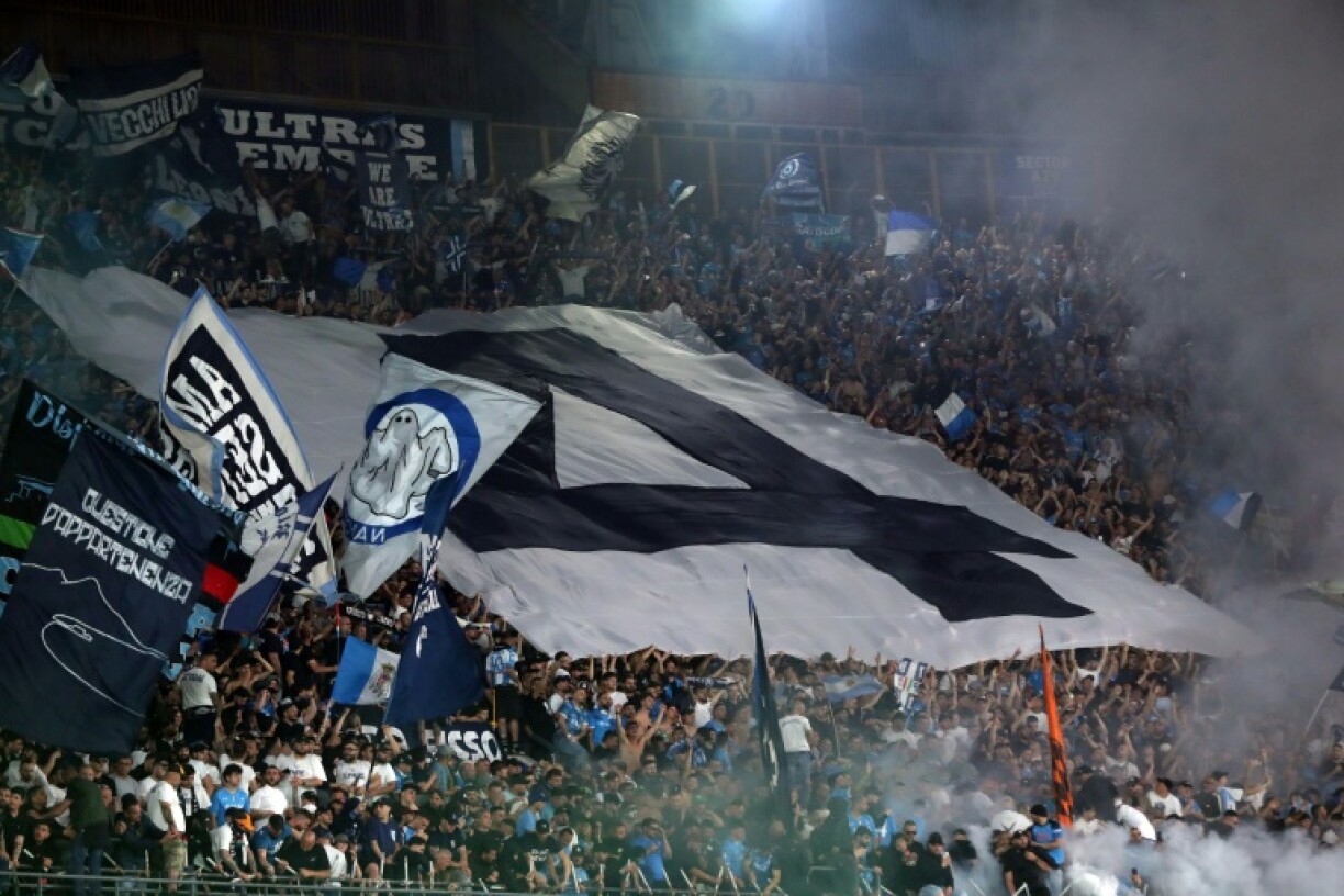 Napoli fans celebrate their team's fourth Serie A title.