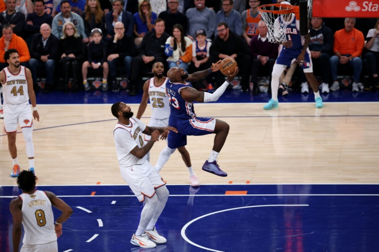 LeBron James drives to the basket in the Philadelphia 76ers defeat of the New York Knicks