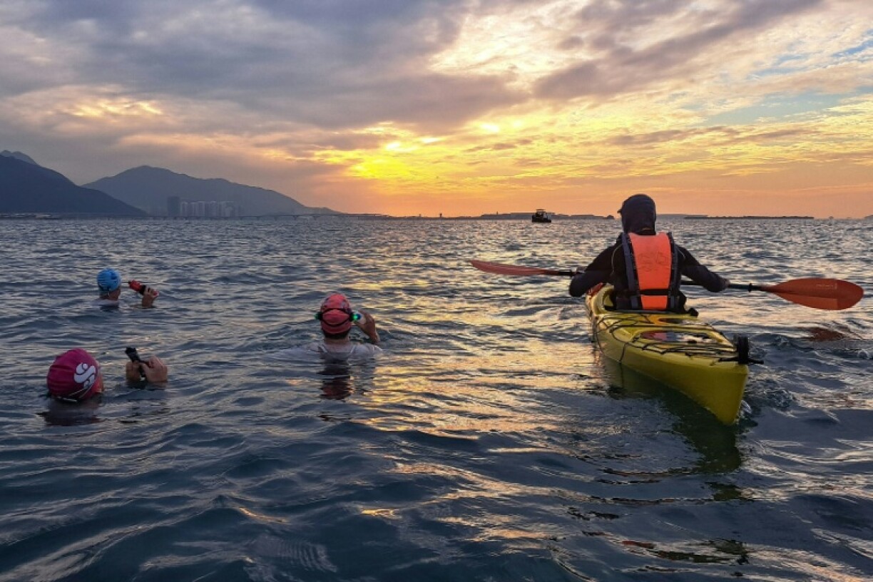 Evening draws in during the swimmers' odyssey around Hong Kong waters